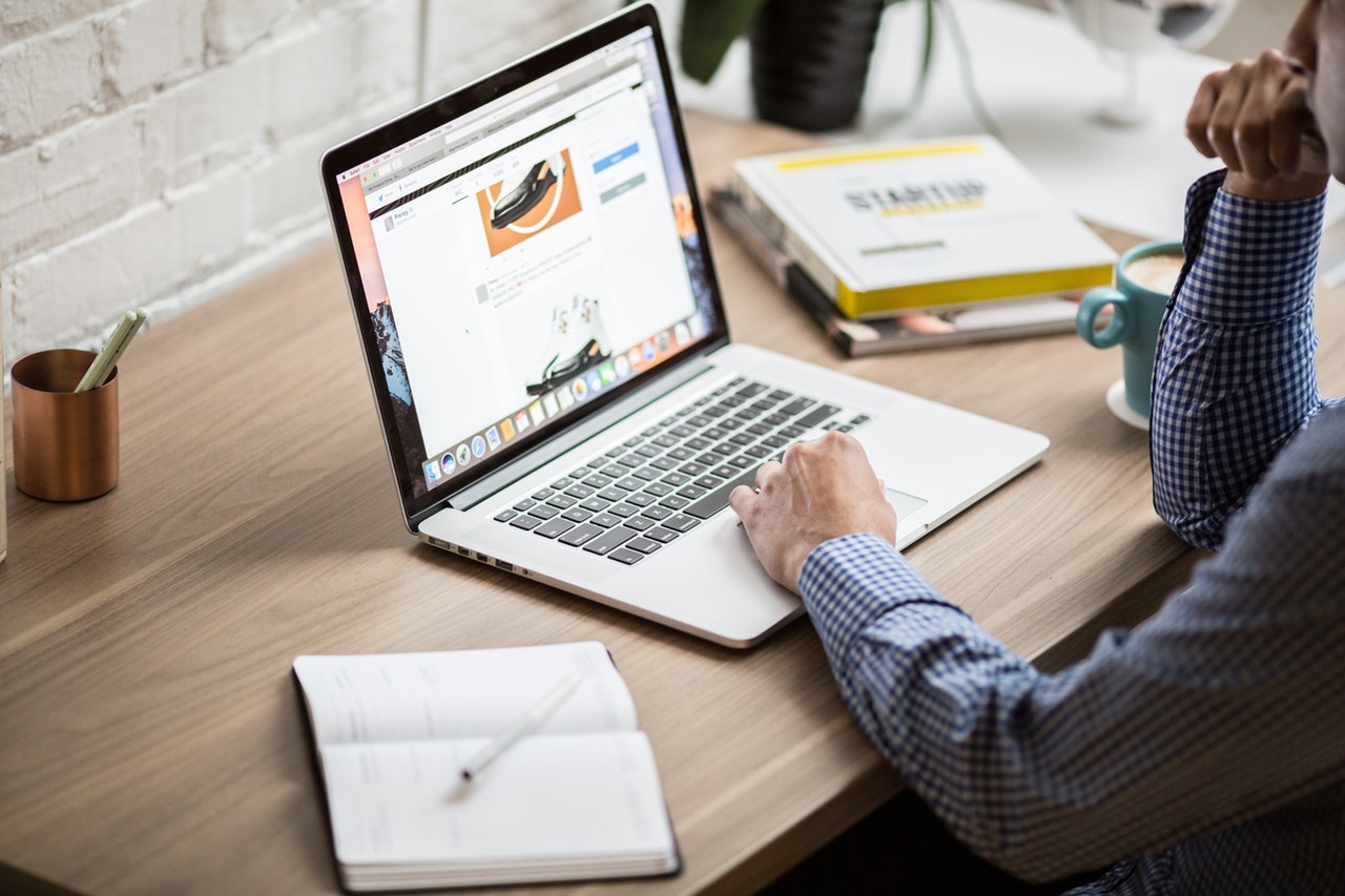 man updating his job search portfolio