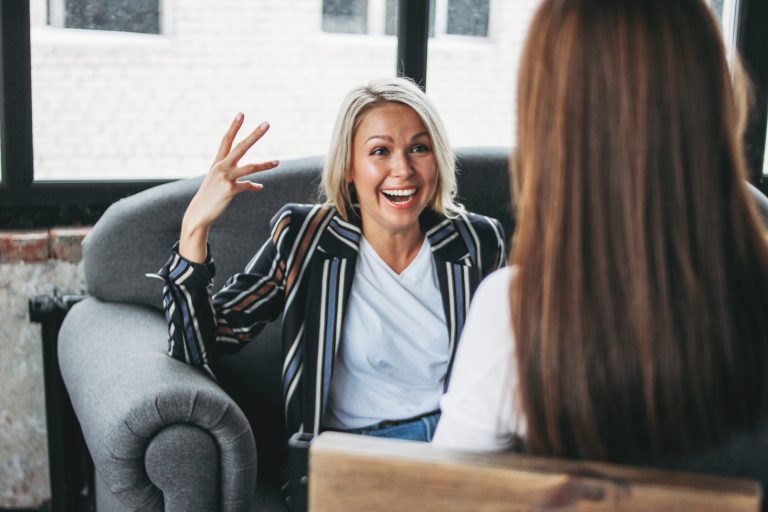 women engaging in interview coaching
