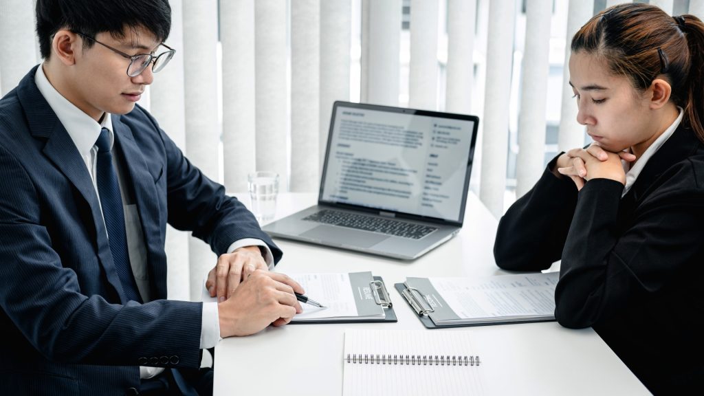 Job recruiters reviewing relevant sections of applicant's resume.